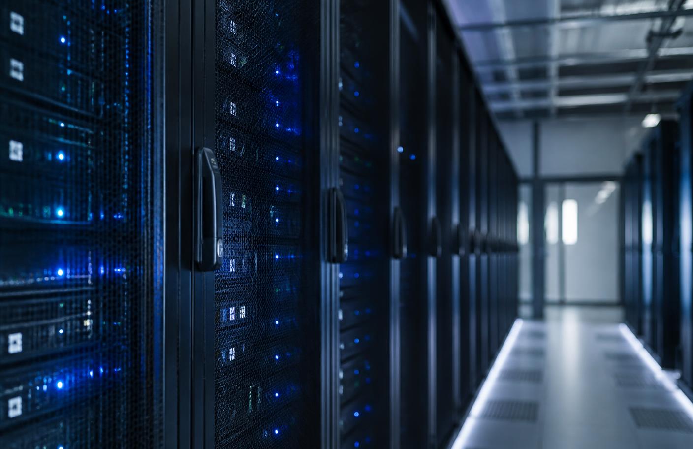 Data centre aisle lined with server racks